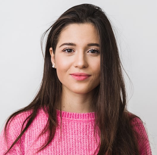 Woman in pink sweater